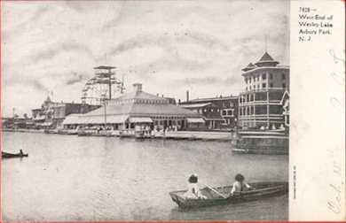 [Wesley lake view of Palace and Ferris Wheel from the Casino side, 1906. post card #5]